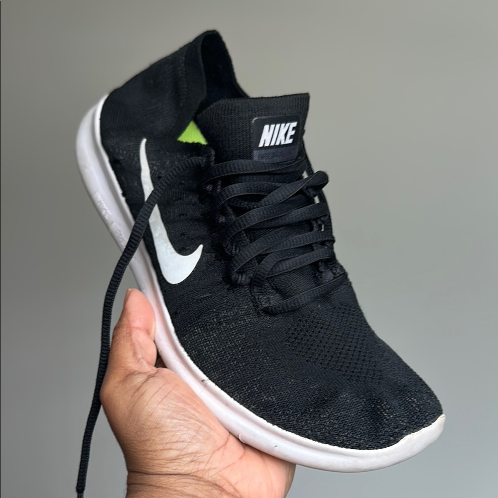 Nike Black and White Free Run Flyknit Athletic Shoe